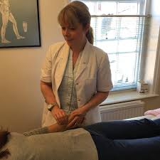 Annmarie Gabriel treating a patient